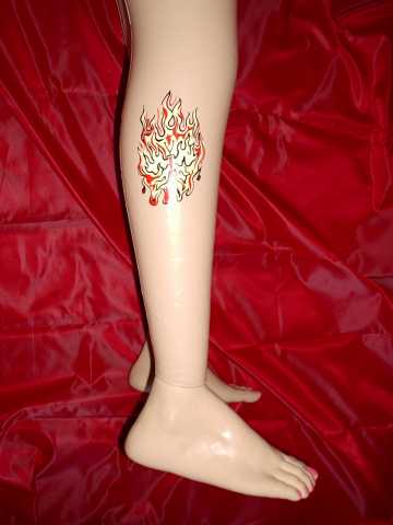 picture of Dayton Rains Tattooed Love Doll; courtesy of Convergence, Inc.